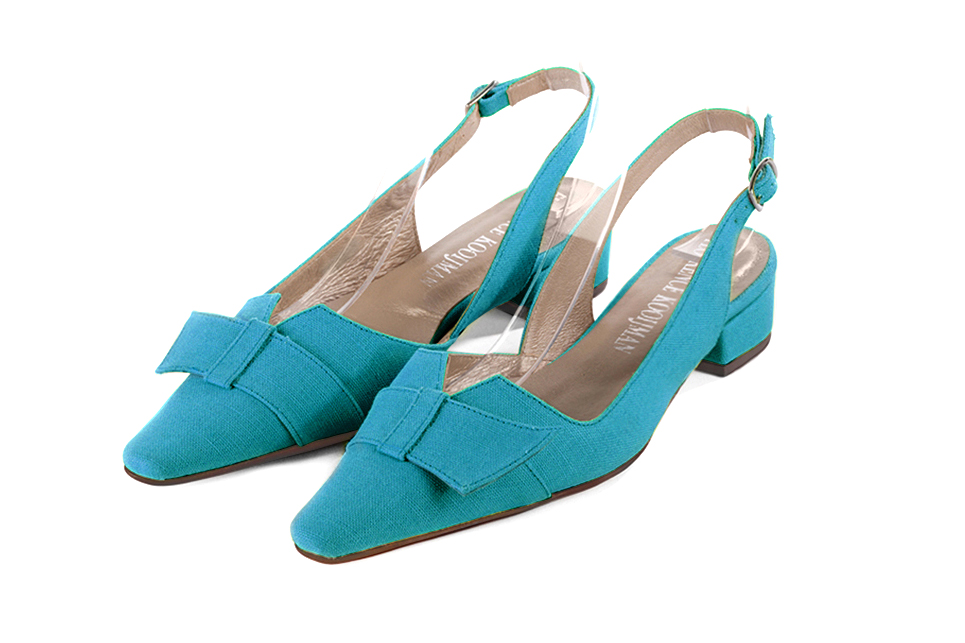 French elegance and refinement for these turquoise blue dress slingback shoes, with a knot, 
                available in many subtle leather and colour combinations. The pretty French spirit of this beautiful pump will accompany your steps nicely and comfortably.
To be personalized or not, with your materials and colors.  
                Matching clutches for parties, ceremonies and weddings.   
                You can customize these shoes to perfectly match your tastes or needs, and have a unique model.  
                Choice of leathers, colours, knots and heels. 
                Wide range of materials and shades carefully chosen.  
                Rich collection of flat, low, mid and high heels.  
                Small and large shoe sizes - Florence KOOIJMAN